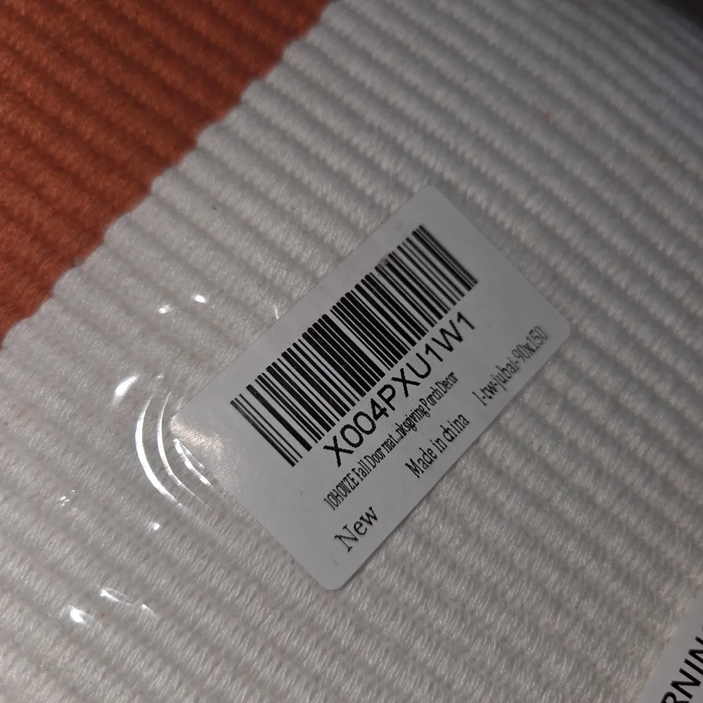 Orange and cream striped cotton throw rug 59'x36
